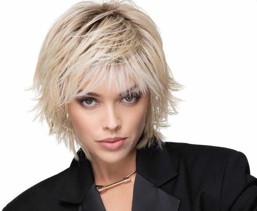28 Lovely Short Layered Hairstyles for Fine Hair (Updated 2022) 22.-Shaggy-bob-with-flat-bangs