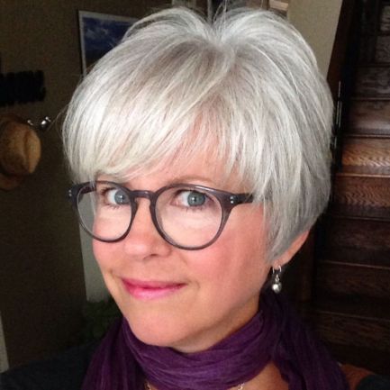 21 Stylish and Easy Short Hairstyles for Women Over 40 (Updated in 2022) Wispy-bangs-with-glasses