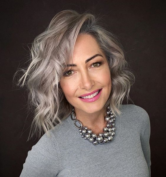 50 Hair Color Ideas for Women Over 40 (Updated 2022) 16.-Gray-platinum-curled-bob