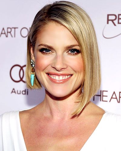 20 Beautiful and Classy Short Hairstyles for Women in 2022 10.-Deep-side-part-asymmetrical-bob