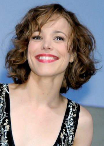 20 Beautiful and Classy Short Hairstyles for Women in 2022 11.-Layered-angled-curly-hairstyle