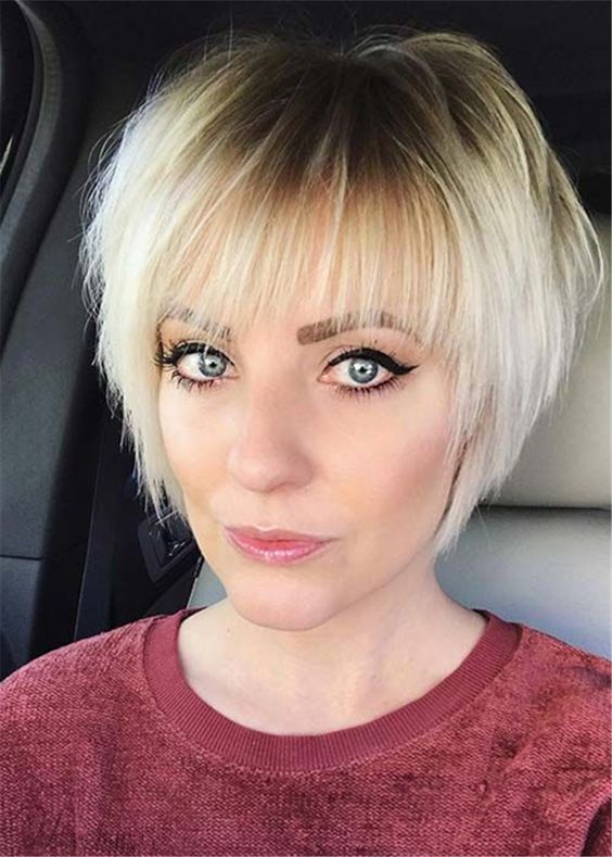 20 Chic Short Straight Hairstyles for Women Over 50 (Updated 2021) Chin-length-choppy-bob