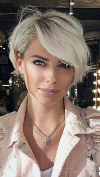 20 Chic Short Straight Hairstyles for Women Over 50 (Updated 2022) Layered-pixie-bob