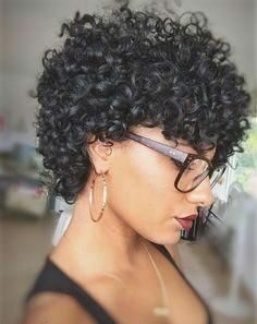 Very short curly wedge hairstyle with glasses