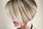 Stacked Wedge With Soft Blonde Highlights