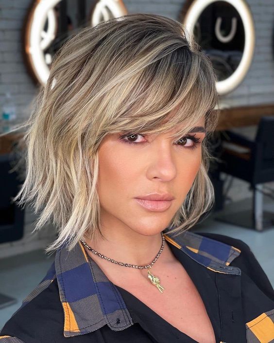 52 Elegant Short Hairstyles for Fine Hair (Update 2022) Wavy-layered-shaggy-haircut-with-bangs