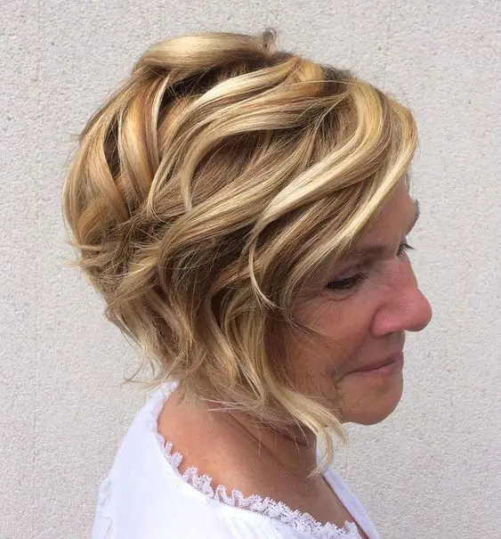 Modern Short Haircuts for Older Women that Look Astonishing (Updated 2022) Angled-curly-bob