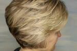 Feathered Wedge Hairstyle With Lowlights Ash Blonde