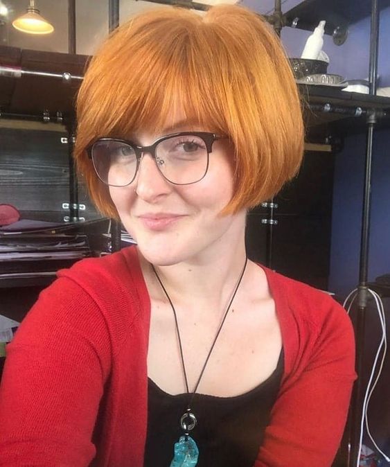 24 Short Sassy Hairstyles for Older Women with Glasses in 2022 Strawberry-blonde-short-bob-with-fringe