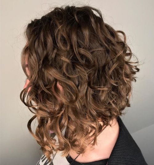 60 Best Short Curly Hairstyles for Women Over 60 in 2022 Curly-angled-lob
