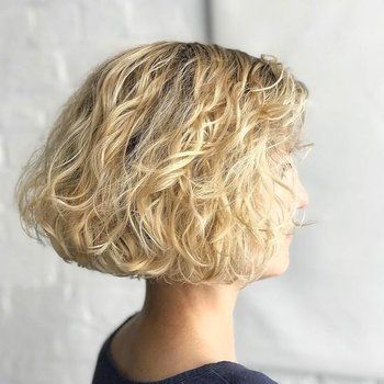 60 Best Short Curly Hairstyles for Women Over 60 in 2022 Curly-blunt-bob-2