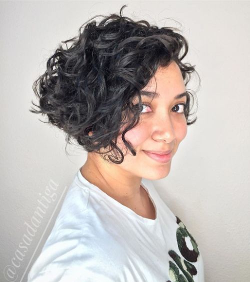 60 Best Short Curly Hairstyles for Women Over 60 in 2022 Shaggy-angled-curly-bob-3