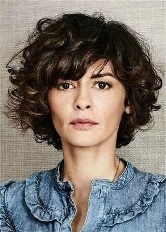 60 Best Short Curly Hairstyles for Women Over 60 in 2022 Short-curly-shaggy-bob
