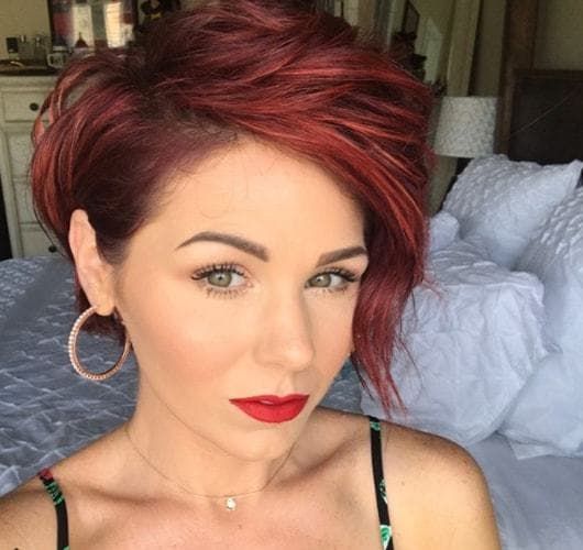 23 Excellent Short and Sassy Haircuts for Women Over 60 (Updated 2022) 10.-Red-pixie-bob-with-undercut
