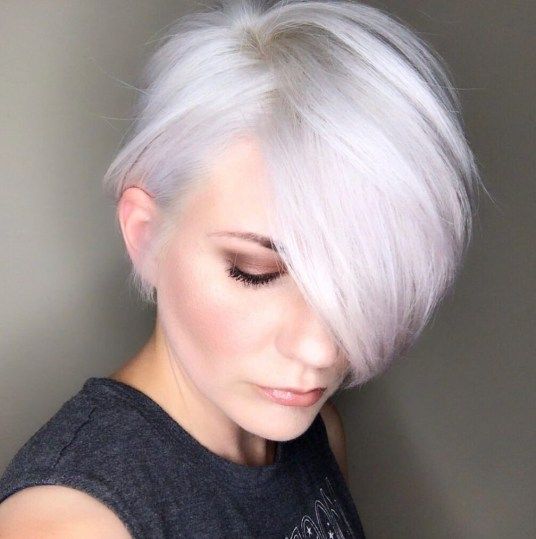 23 Excellent Short and Sassy Haircuts for Women Over 60 (Updated 2022) 7.-Pixie-haircut-with-long-bangs