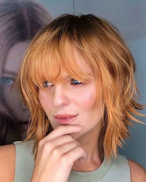 50 Layered Bob Haircuts with Bangs that You Should Try in 2022 22.-Inverted-shaggy-bob