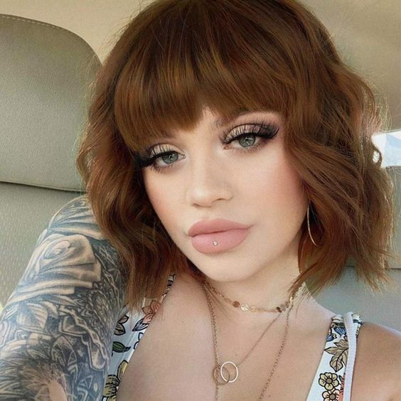 50 Layered Bob Haircuts with Bangs that You Should Try in 2022 23.-Fluffy-wavy-bob
