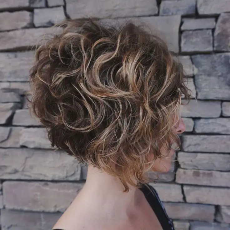 24 Easy Short Vintage Hairstyles to Try in 2022 Inverted-curly-wedge-hairstyle