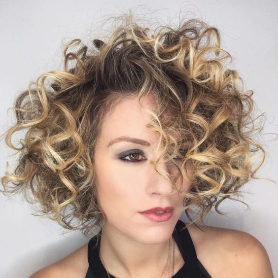 Side swept curly hairstyle