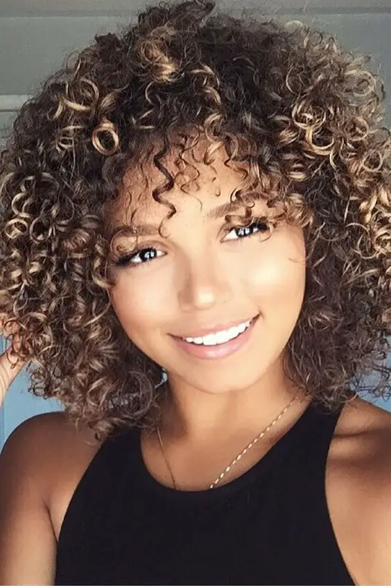 must try bob hairstyle if you have a curly hair