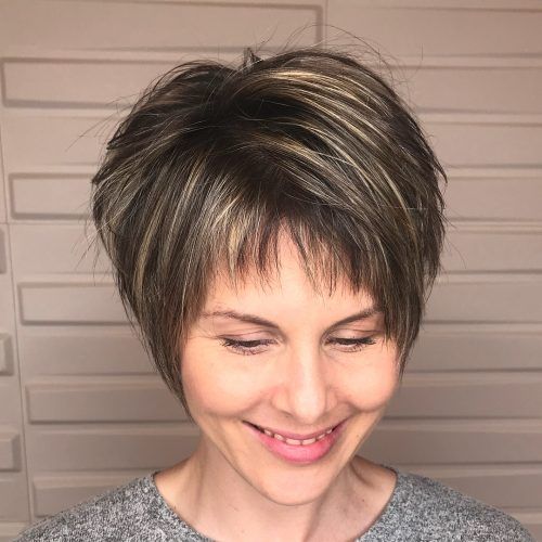 20 Proper Short Hairstyles for Women Over 50 with Fine Hair Short-layered-wedge-with-highlights