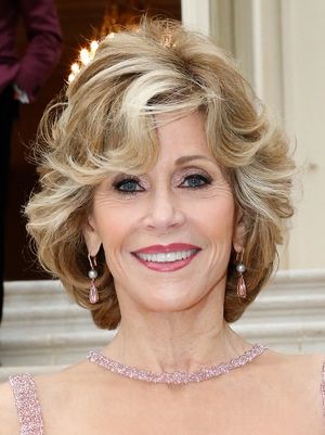 45 Short Hairstyles for Women Over 50 for Fresh and Fashionable Look curly-hairstyle-with-bangs-for-women-over-50