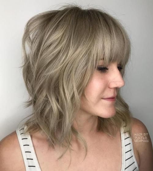 20 Greatest Layered Bob Hairstyles for Older Women Angled-wavy-bob-with-flat-bangs