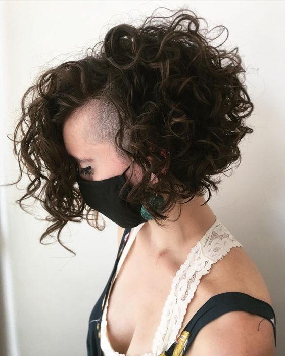 Curly angled bob with undercut