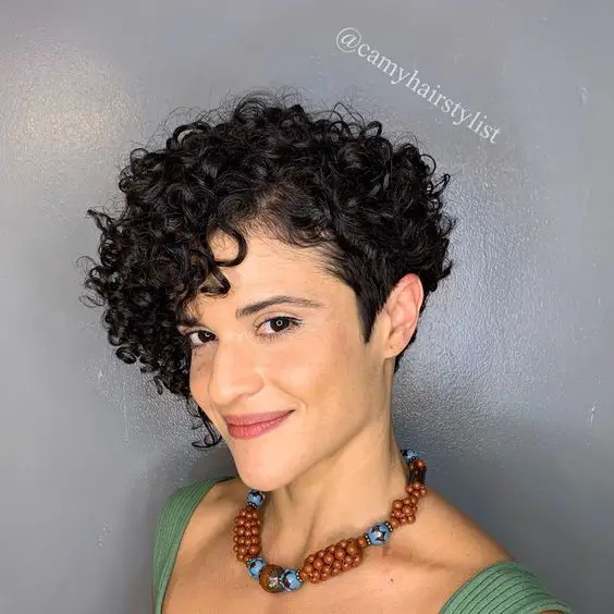 Short curly asymmetrical hairstyle