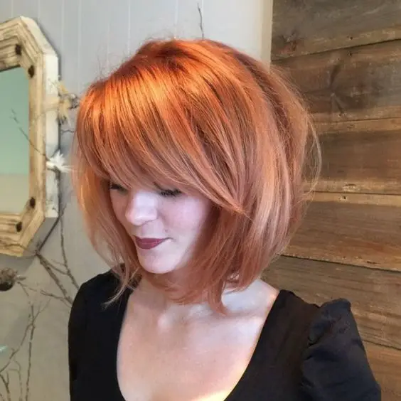 Here are 20 Best Short Haircuts for Straight Hair (Updated 2022) Stacked-angled-bob-with-bangs