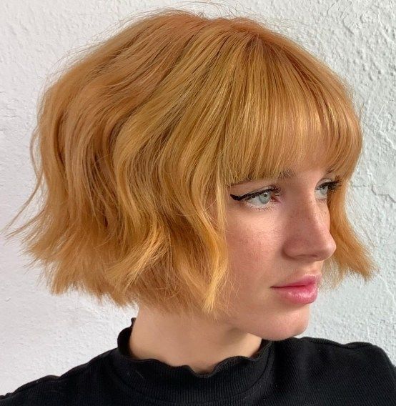20 Appealing Short Edgy Haircuts for Women that on Trends Right Now Textured-blunt-wavy-bob-with-flat-bangs