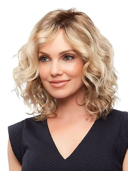50 Formal Short Hairstyles for Older Women (Updated in 2022) Wavy-bob-curtain-bangs