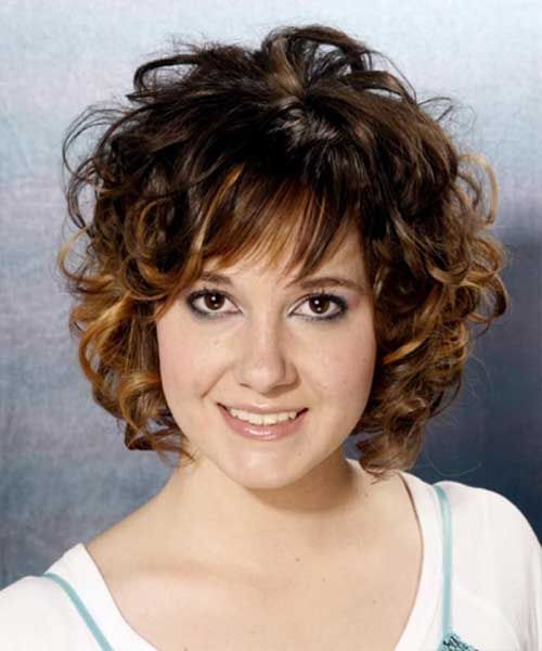 beautiful curly shag haircut for women over 50 with thick hair