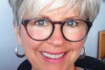 Beautiful Short Flat Haircut With Bangs With Grey Hair And Glasses