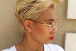Chic Looking Side Swept Haircut For Women With Blonde And Thick Hair