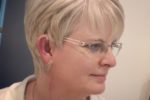 Cute Looking Layered Short Haircut For Older Women With Glasses