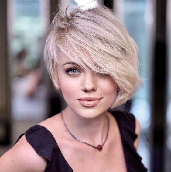 60 Excellent Short Hairstyles for Round Faces to Look Stunning Asymmetrical-pixie-with-side-bangs