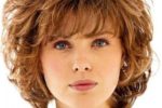 Cute Looking Curly Haircut With Bangs For Over 50 Women