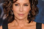 64 Awesome Short Curly Hairstyles for Women over 50 (Updated in 2022) modern-wavy-curly-haircut-for-women-over-50-with-thick-hair-150x100