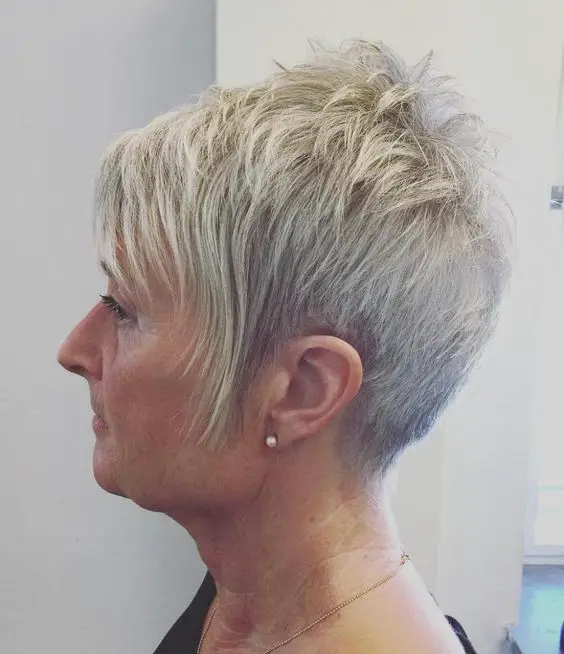 pretty looking teased choppy hairstyle for women over 60