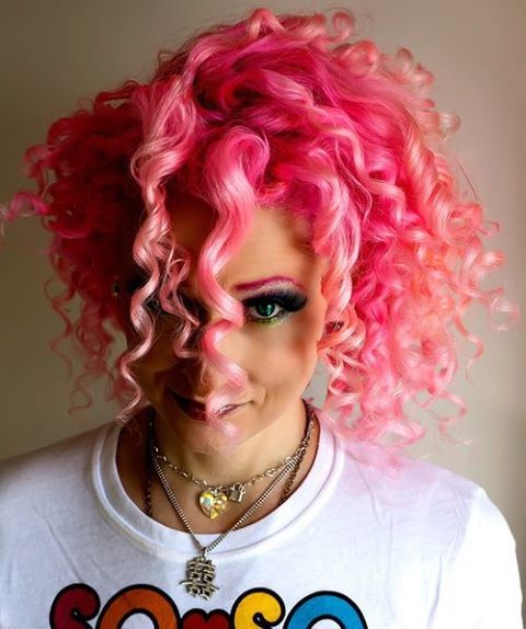 The Bright Pink Curls Style for Short Hair 2