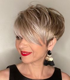 30 Inspiring Pixie Haircuts for Women Over 60 Years Old (Updated 2022) Layered-pixie-cuts-with-bangs