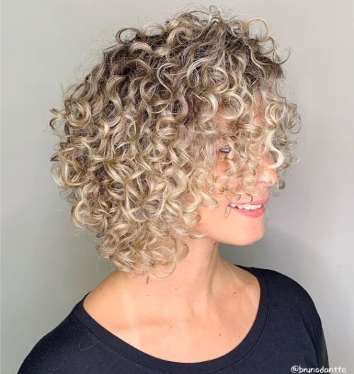 Curly angled cut with layers