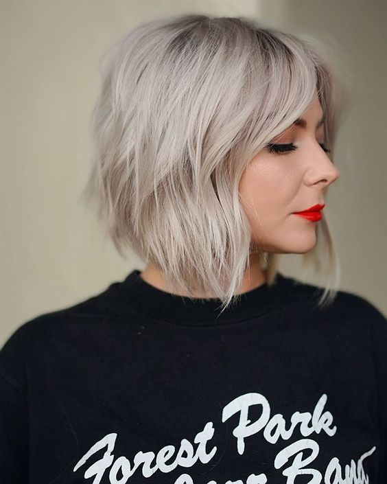 100 Flattering Short Hairstyles for Women Over 50 with Fine Hair Short-wavy-bob-with-curtain-bangs