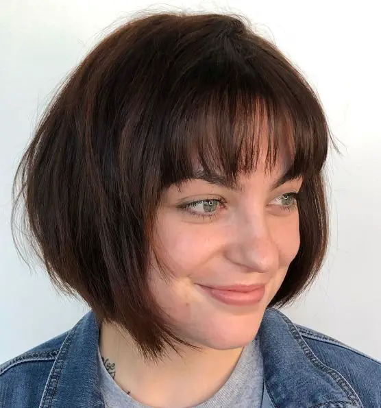 100 Flattering Short Hairstyles for Women Over 50 with Fine Hair (2022) Stacked-angled-bob-with-bangs