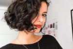Short Voluminous Curly Hairstyle With Deep Side Part