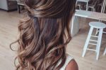 Crossed And Wavy Half Updo