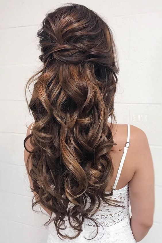 Crossed and Wavy Half Updo