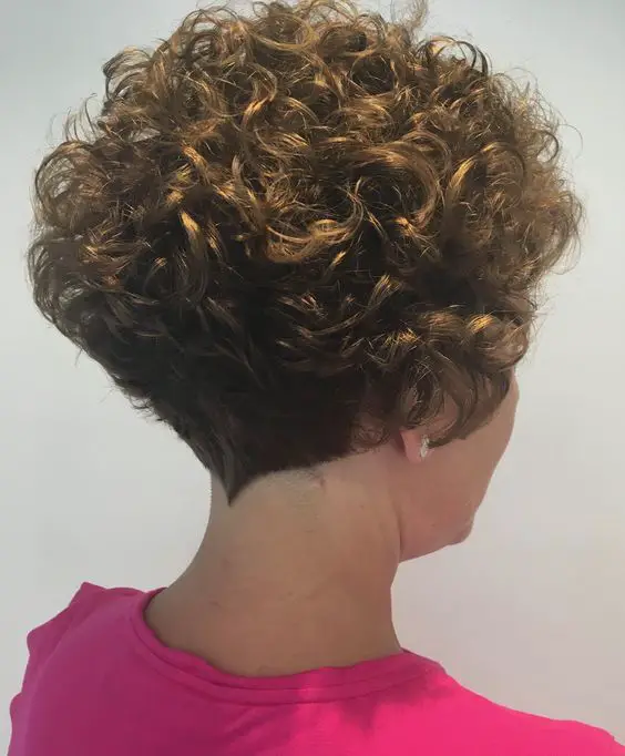 very short natural curly wedge haircut